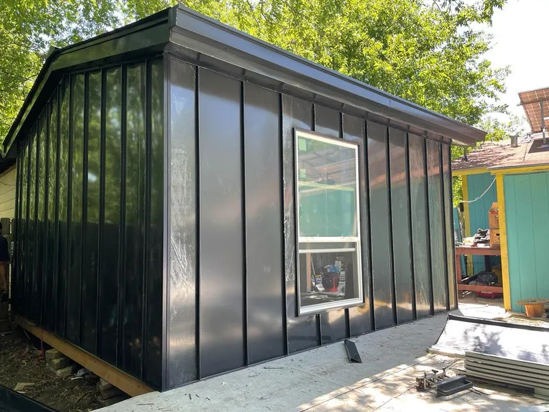 Black standing seam metal wall panels for Roof Inspection in Mendham